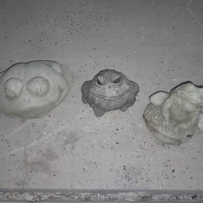 Two small cement garden / pond frogs and a happy toad