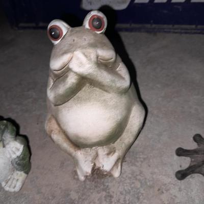 Collection of small yard & garden frogs in a milk crate