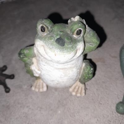 Collection of small yard & garden frogs in a milk crate