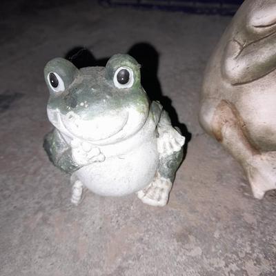 Collection of small yard & garden frogs in a milk crate