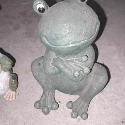 Collection of small yard & garden frogs in a milk crate