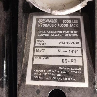 Automotive items safety pack, jumper cables, flares, and emergency with Sears Hydraulic floor Auto Jack