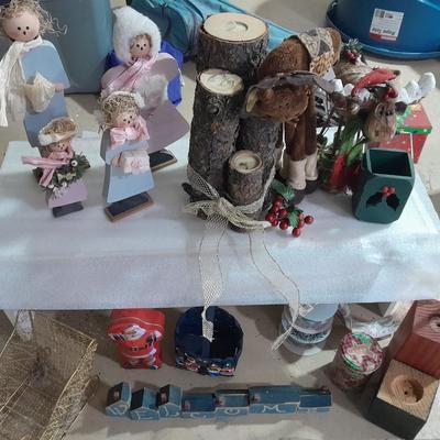 Christmas decorations, scented brooms, log candles, standing deer Carolers and more.