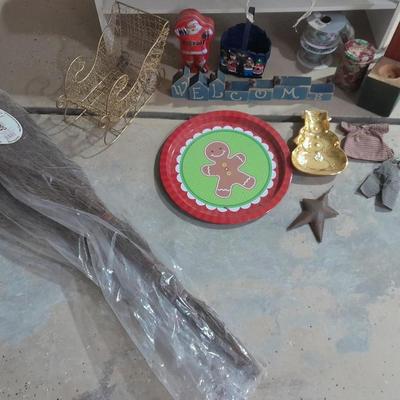 Christmas decorations, scented brooms, log candles, standing deer Carolers and more.
