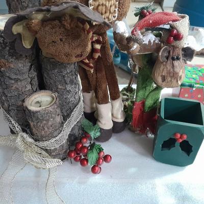 Christmas decorations, scented brooms, log candles, standing deer Carolers and more.