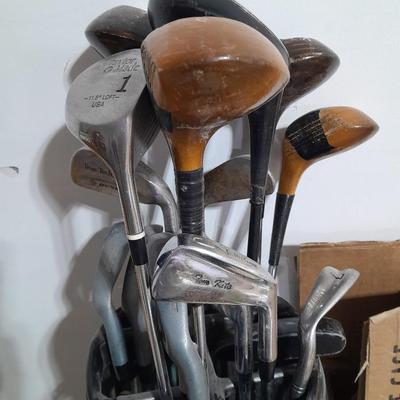 Assortment of Golf Clubs in Golf bag