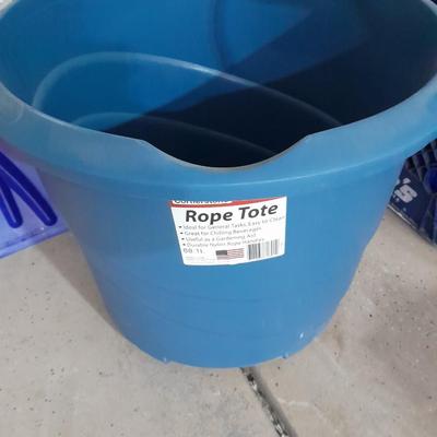 Snow shovels, Push broom, mop, and how with a 18 gallon rope tote
