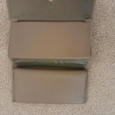 Black purse with wallet and evening bag