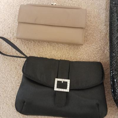 Black purse with wallet and evening bag