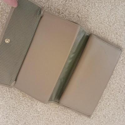Black purse with wallet and evening bag