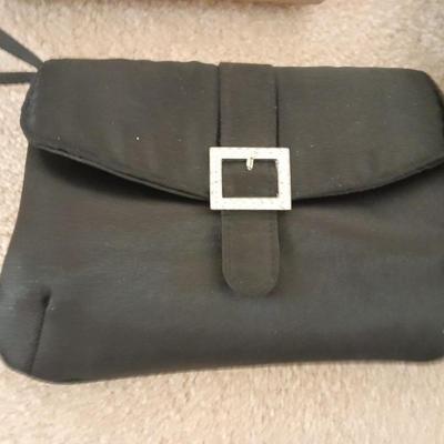 Black purse with wallet and evening bag