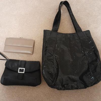 Black purse with wallet and evening bag