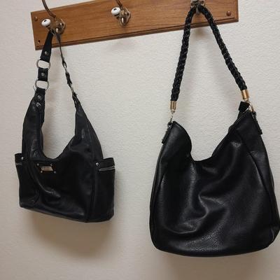 Two black leather-like purses in great condition Miztigne and Nicole