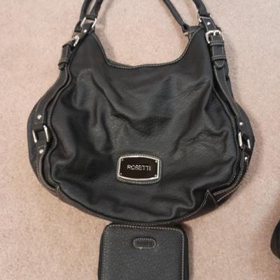 Two black leather like Rosetti purses and a small black Rosetti wallet