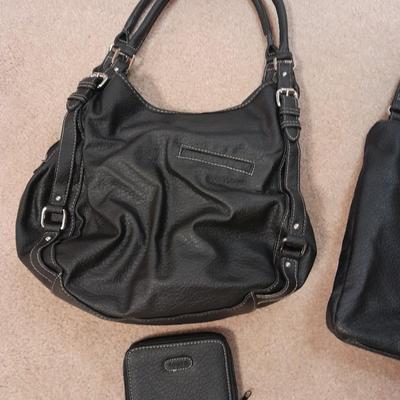 Two black leather like Rosetti purses and a small black Rosetti wallet