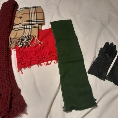 Winter scarves and black driving gloves