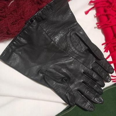Winter scarves and black driving gloves