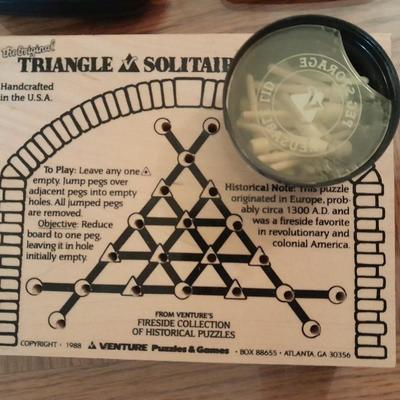 Electronic games and a Triangle solitaire game