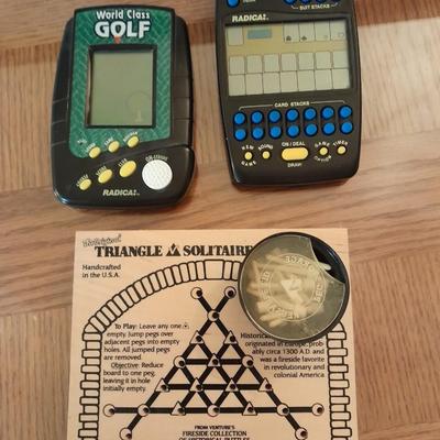 Electronic games and a Triangle solitaire game