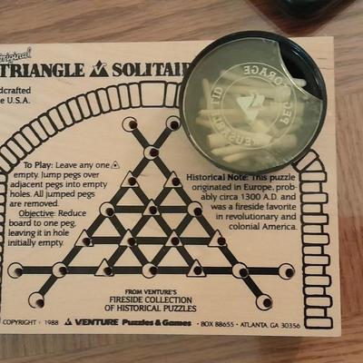 Electronic games and a Triangle solitaire game