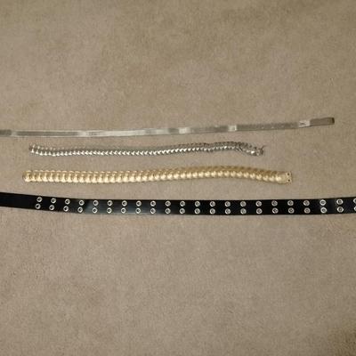 Women's decorative belts, leather with hole studs, concho belts, and silver metal like belt