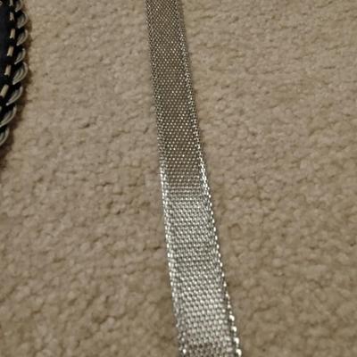 Women's decorative belts, leather with hole studs, concho belts, and silver metal like belt