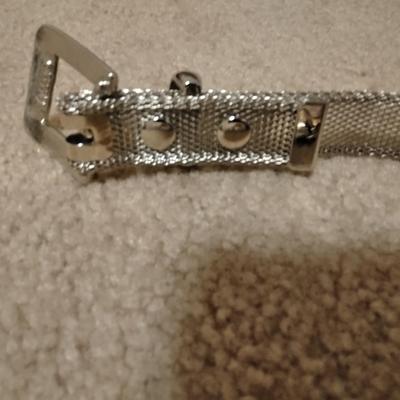 Women's decorative belts, leather with hole studs, concho belts, and silver metal like belt