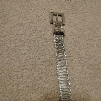 Women's decorative belts, leather with hole studs, concho belts, and silver metal like belt