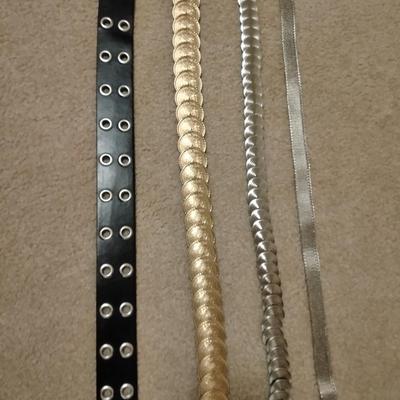 Women's decorative belts, leather with hole studs, concho belts, and silver metal like belt