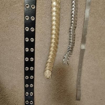 Women's decorative belts, leather with hole studs, concho belts, and silver metal like belt