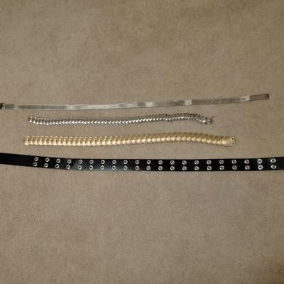 Women's decorative belts, leather with hole studs, concho belts, and silver metal like belt