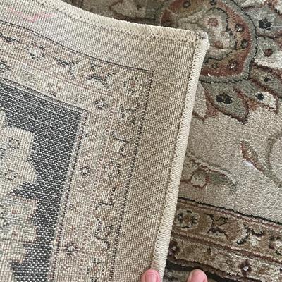 Beige area rug
