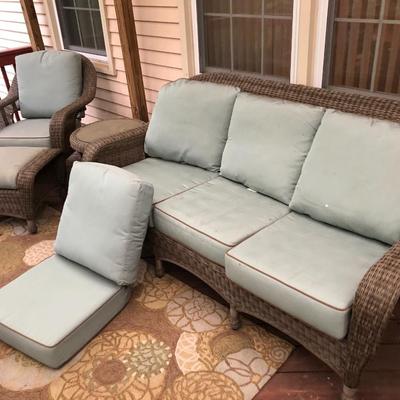 Four Piece Outdoor Patio Set with Cushions (Wicker Like) -Lot 451