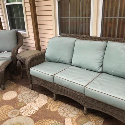 Four Piece Outdoor Patio Set with Cushions (Wicker Like) -Lot 451