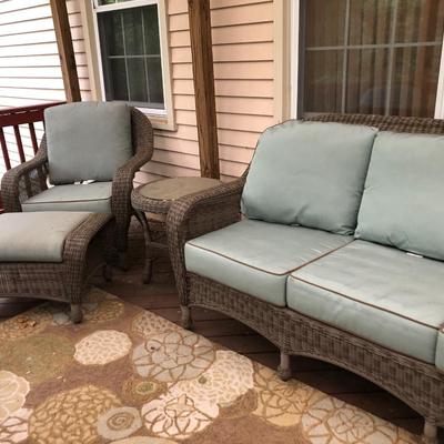 Four Piece Outdoor Patio Set with Cushions (Wicker Like) -Lot 451