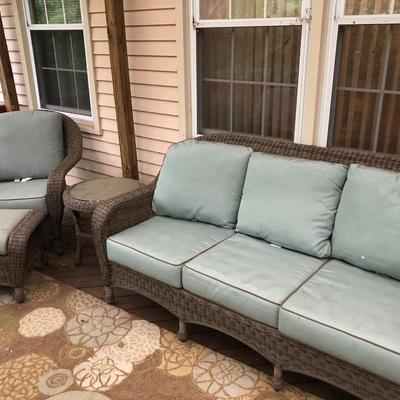 Four Piece Outdoor Patio Set with Cushions (Wicker Like) -Lot 451