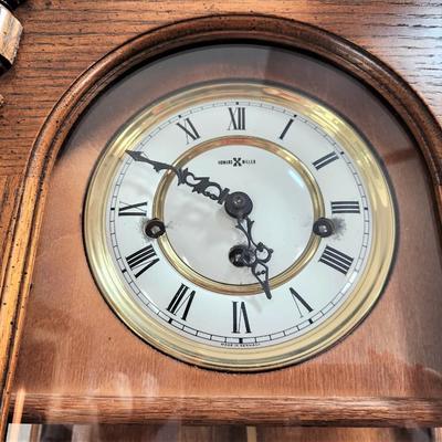 Lot #170  Howard Miller Wall Clock - Good working condition, with key