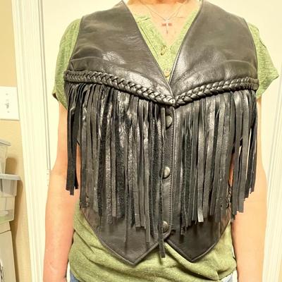 Leather vest with leather fringe. Size Large