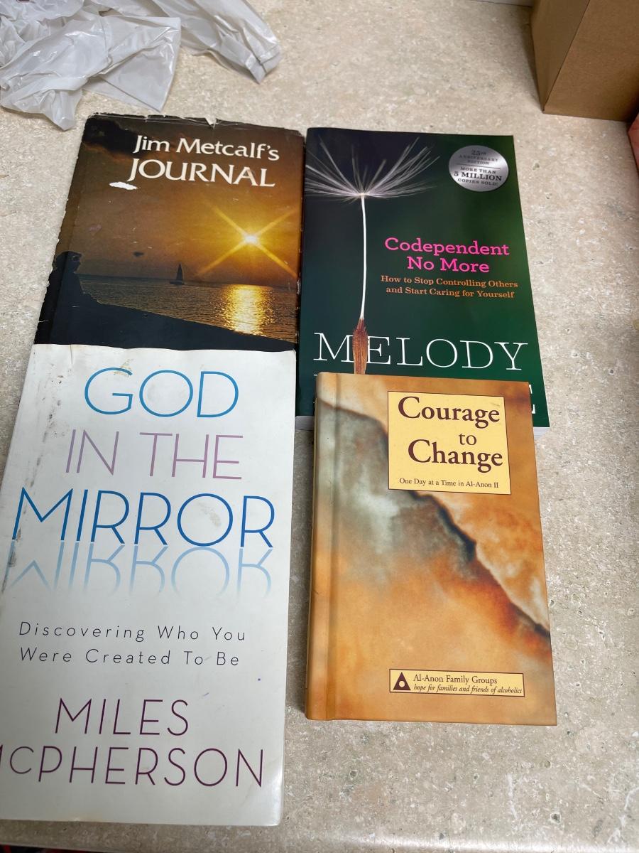 I lot of 4 books | EstateSales.org