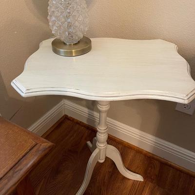 White accent table. 25â€ high, 19â€ wide, 14â€ deep.