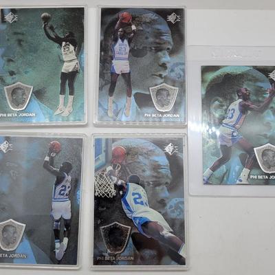 LOT 76: Collection of Kobe Bryant & Michael Jordan NBA Upper Deck Cards & Pogs