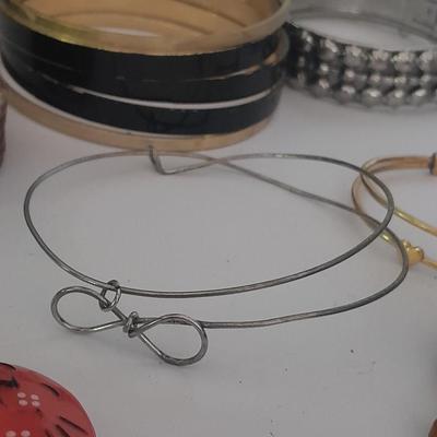 Collection of fun pins and Bracelets