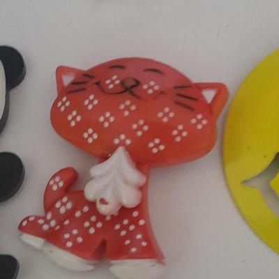 Collection of fun pins and Bracelets