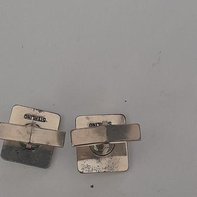 Sterling cuff links with turquois and a matching tie clip