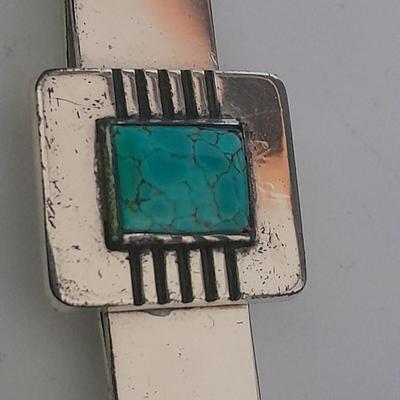 Sterling cuff links with turquois and a matching tie clip
