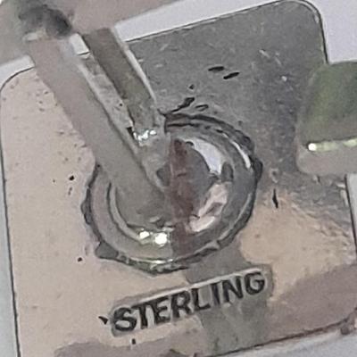 Sterling cuff links with turquois and a matching tie clip