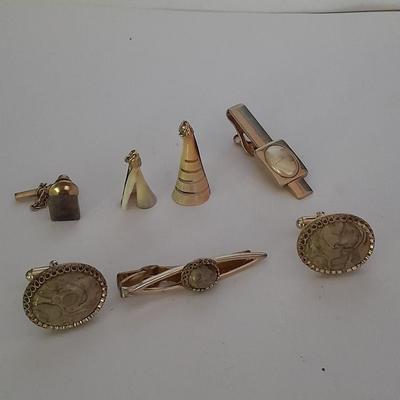 Tour Fossil'd Marked Cuff links, two tie clips, one marked Swank and shell charms.
