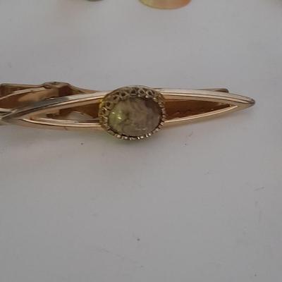 Tour Fossil'd Marked Cuff links, two tie clips, one marked Swank and shell charms.