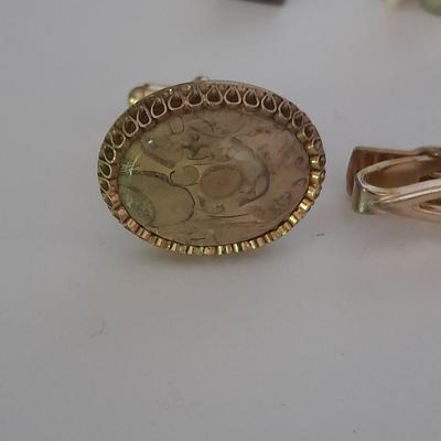 Tour Fossil'd Marked Cuff links, two tie clips, one marked Swank and shell charms.