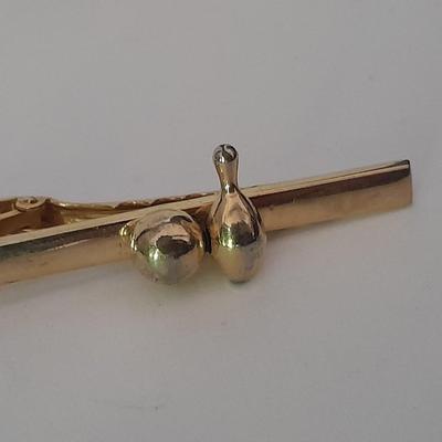 Men's mother of pearl ring, bowling award swank marked tie clips, and cuff links